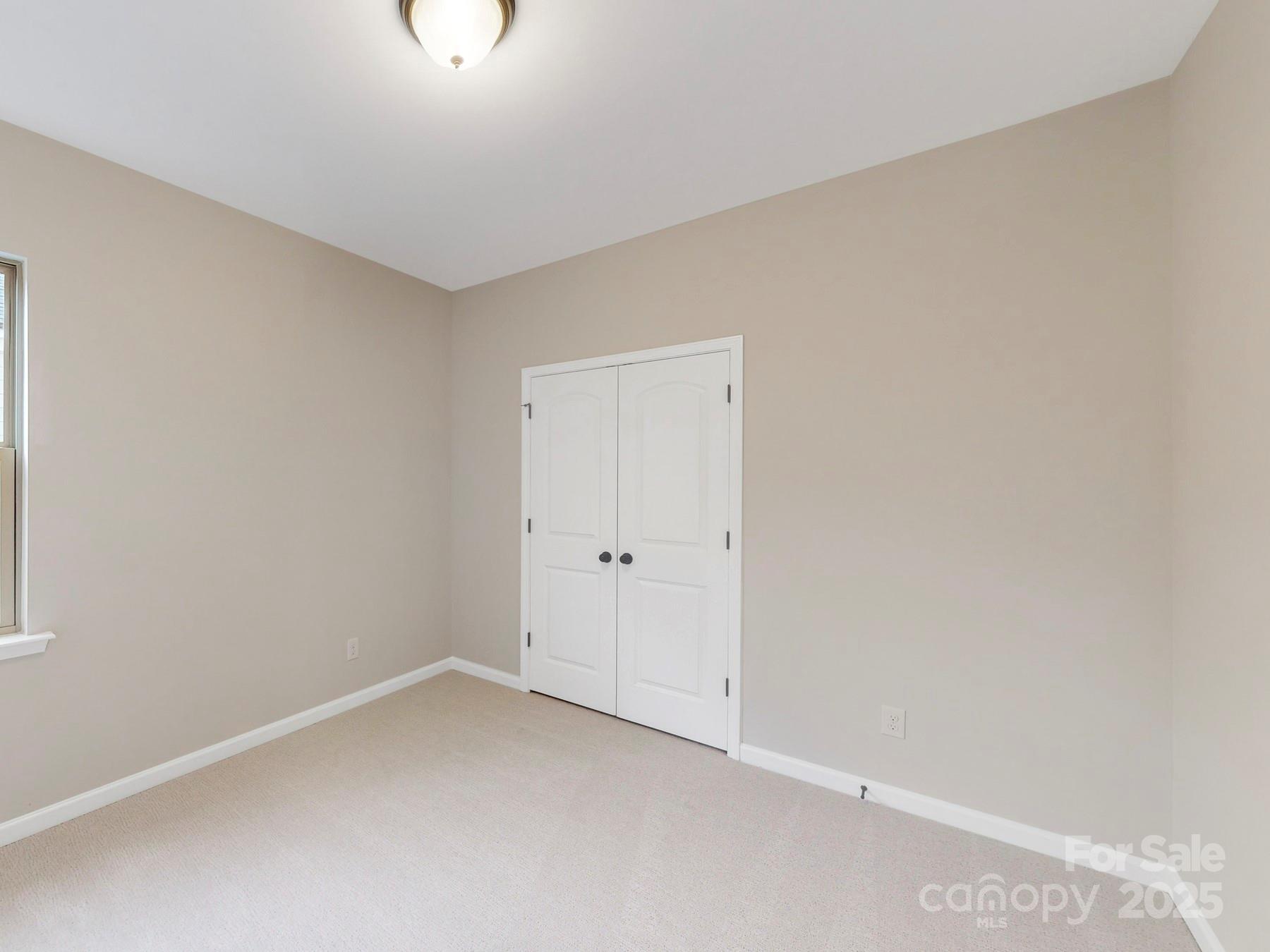 7089 Cobblefield Lane Denver, NC 28037 - Photo 23 of 36 a view of an empty room