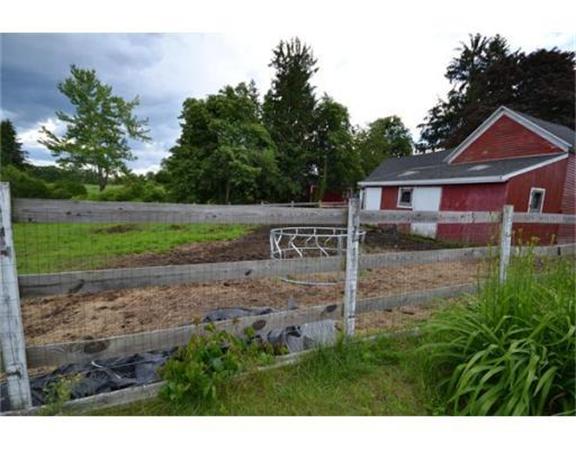 644 Northfield Road Lunenburg, MA 01462 - Photo 4 of 13 a view of a house with a yard