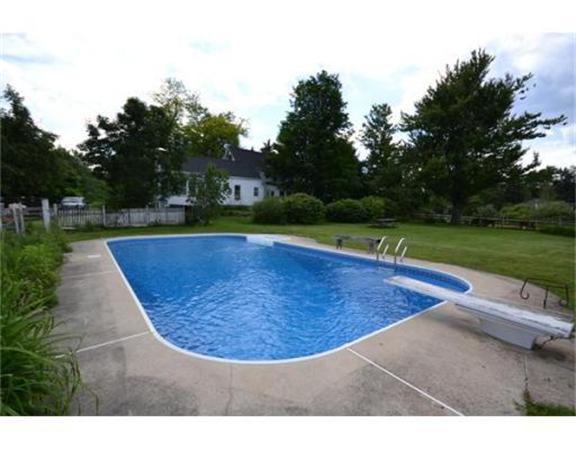 644 Northfield Road Lunenburg, MA 01462 - Photo 5 of 13 a view of a backyard with swimming pool
