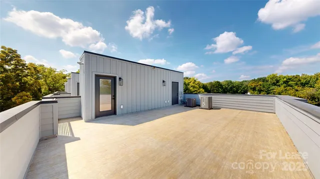 a view of balcony with yard