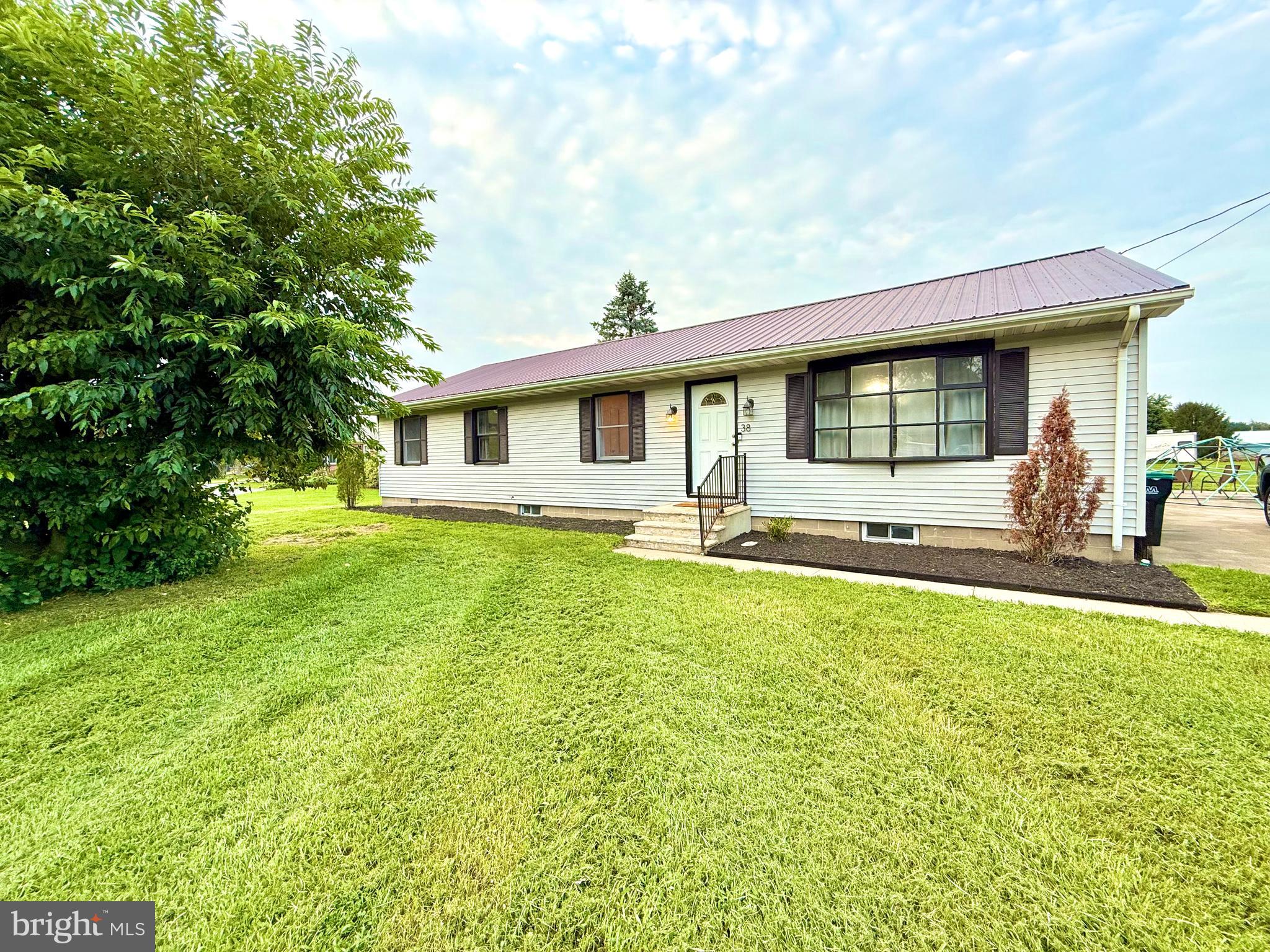 38 South Carter Road Smyrna, DE 19977 - Photo 1 of 30 a front view of a house with a yard