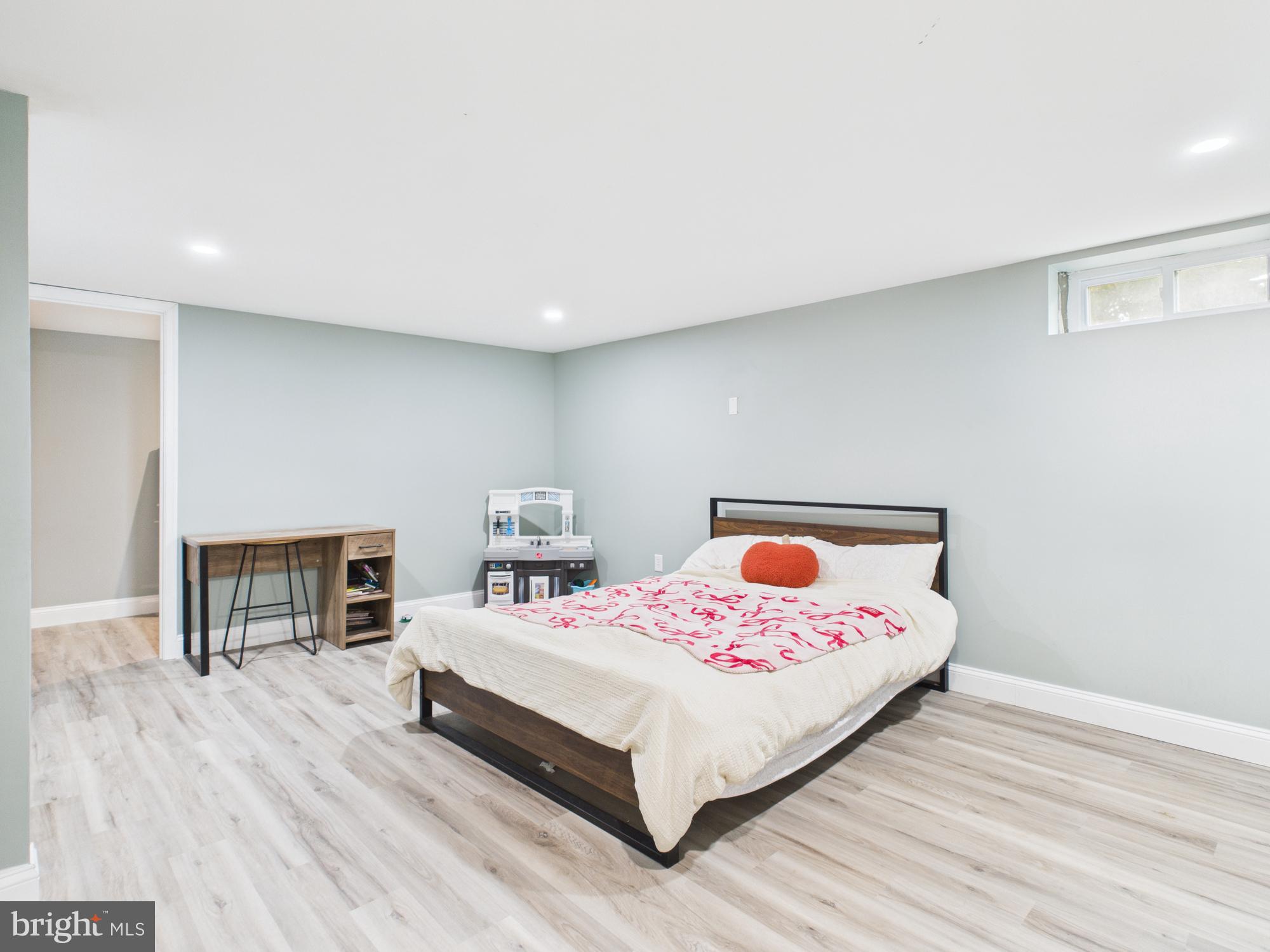 38 South Carter Road Smyrna, DE 19977 - Photo 20 of 30 a bedroom with a bed and a table