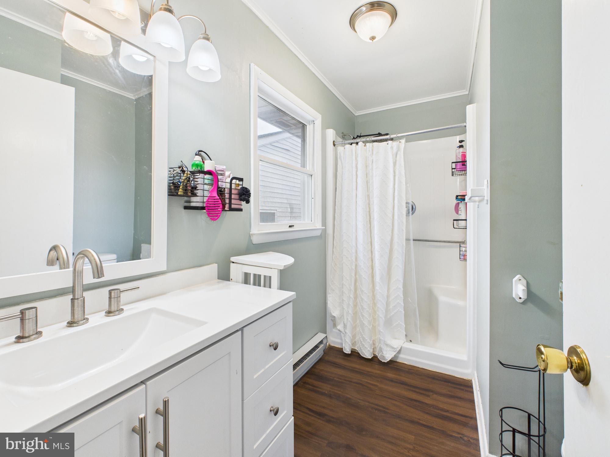 38 South Carter Road Smyrna, DE 19977 - Photo 22 of 30 a bathroom with a sink vanity and a mirror