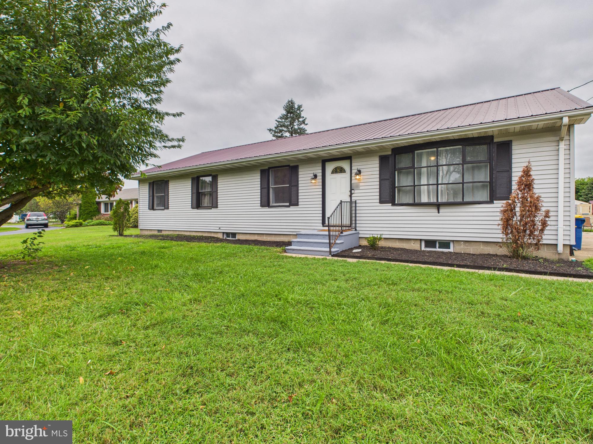 38 South Carter Road Smyrna, DE 19977 - Photo 29 of 30 a front view of house with yard and outdoor seating