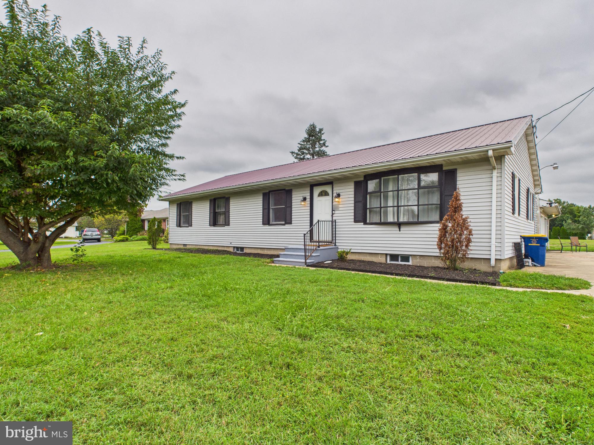 38 South Carter Road Smyrna, DE 19977 - Photo 30 of 30 a front view of house with yard and outdoor seating