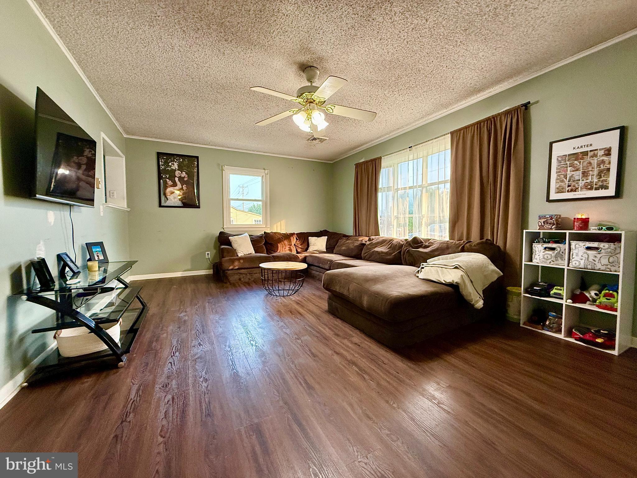 38 South Carter Road Smyrna, DE 19977 - Photo 5 of 30 a spacious bedroom with a bed and wooden floor
