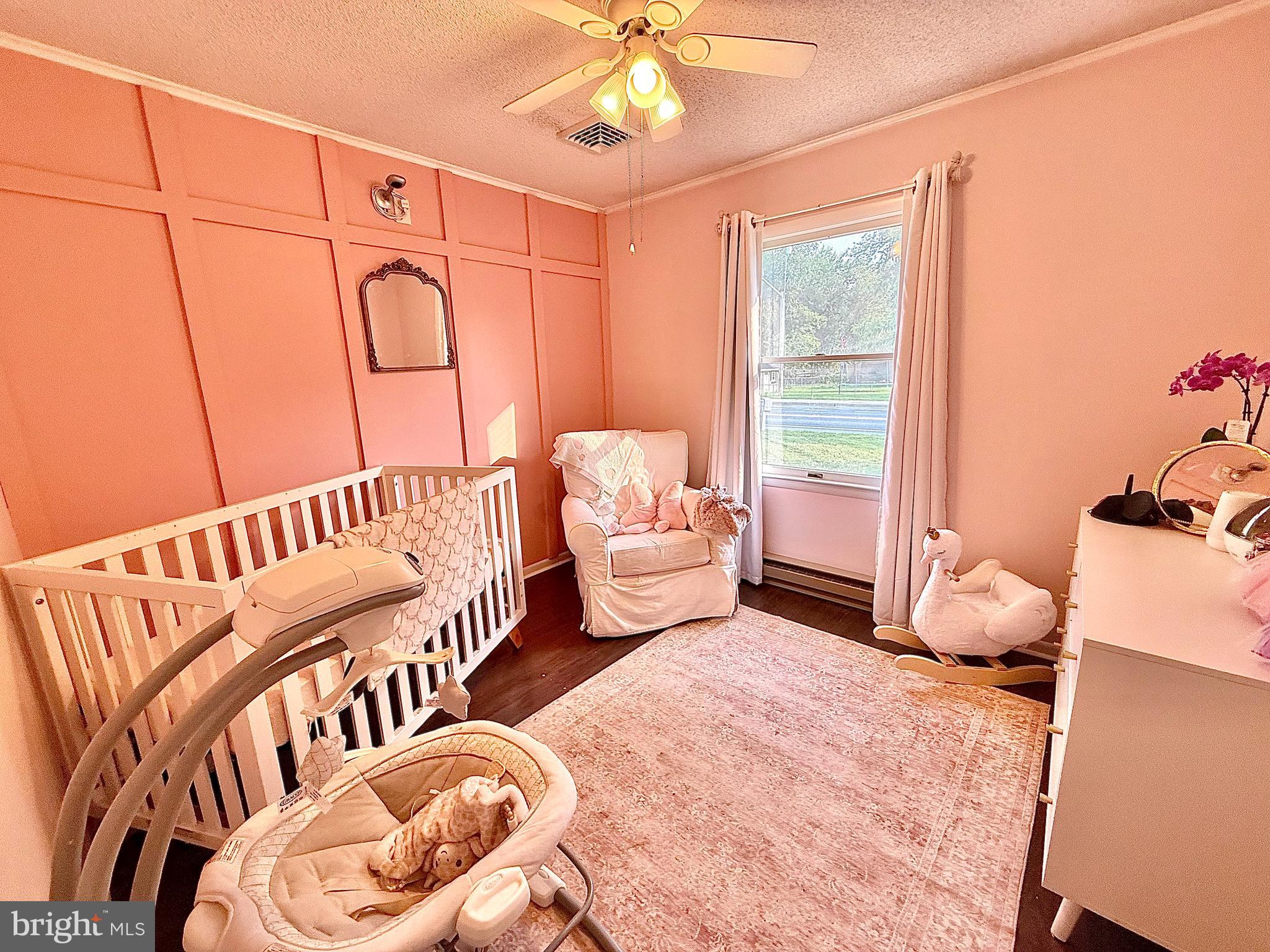 38 South Carter Road Smyrna, DE 19977 - Photo 6 of 30 a bedroom with furniture and wooden floor