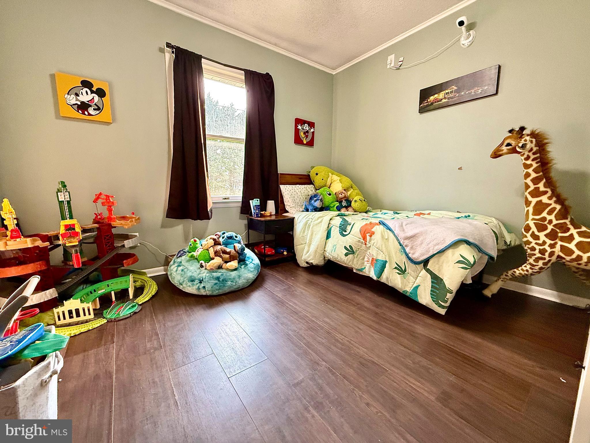38 South Carter Road Smyrna, DE 19977 - Photo 8 of 30 a bedroom with bed and a window