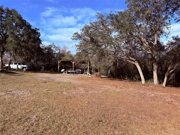 a view of outdoor space with trees