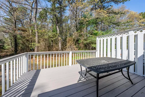 a view of a wooden bench in the deck