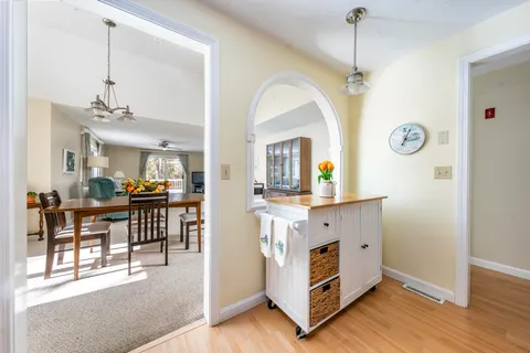 a view of living room with furniture and window