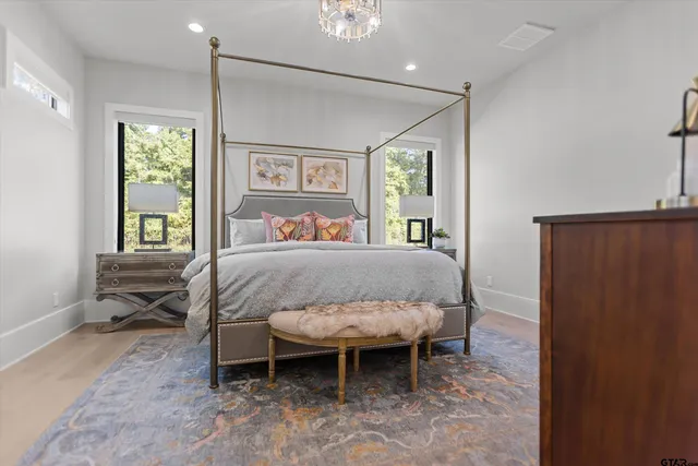 a bed room with furniture and a window