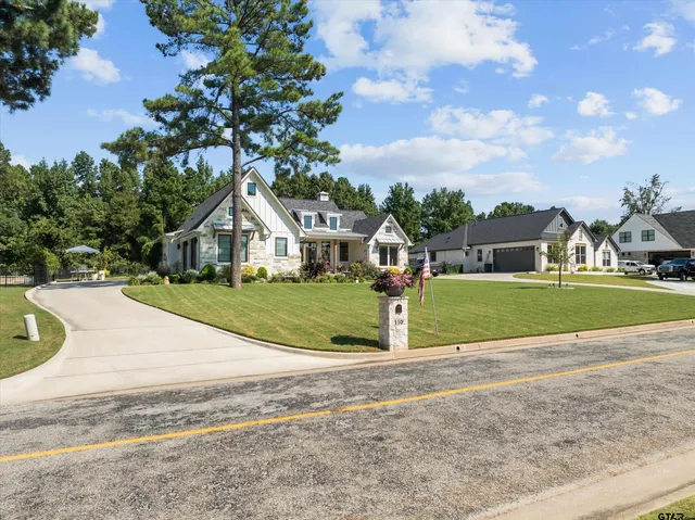 a house with garden in front of it
