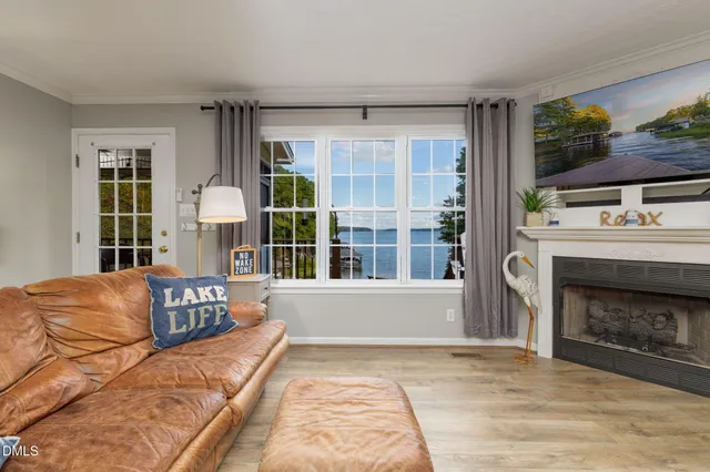 a view of a room with a table and chairs