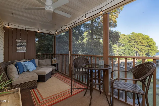 a bed room with furniture and a chandelier
