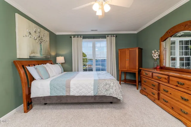 a utility room with cabinets washer and dryer