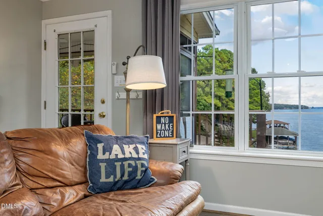 a bedroom with a large bed and a large window