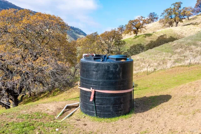 a view of a yard with an outdoor space