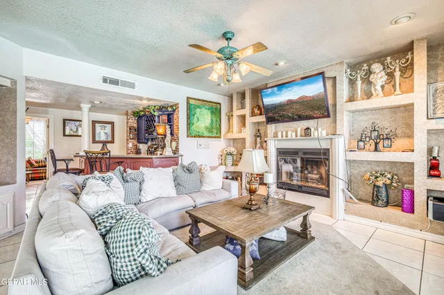 a kitchen with stainless steel appliances kitchen island granite countertop a sink and cabinets