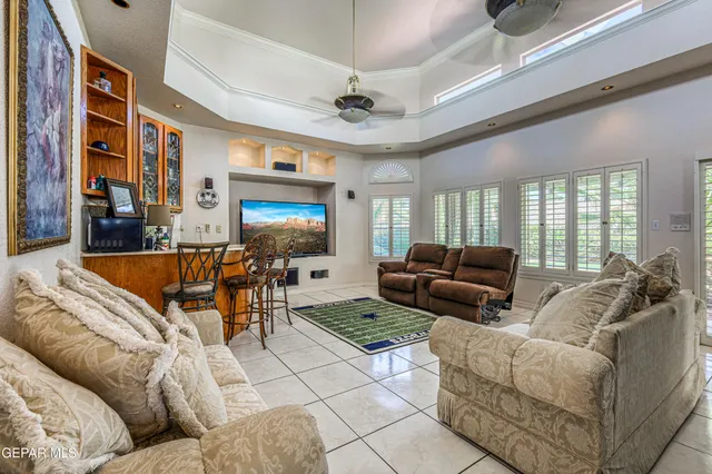 a living room with a couch and a flat screen tv