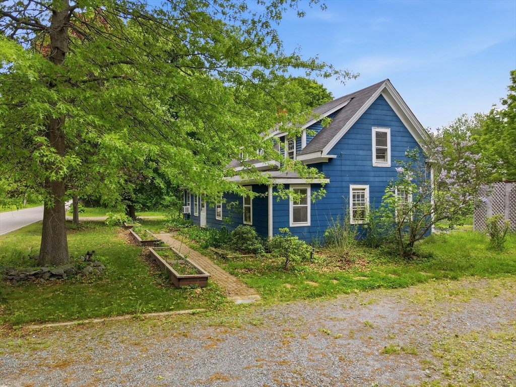 200 Stockbridge Road Scituate, MA 02066 - Photo 12 of 14 a front view of a house with a yard