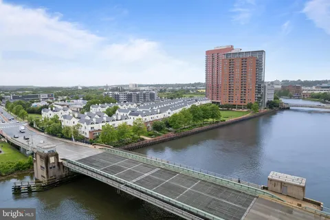 an aerial view of a city with lawn chairs