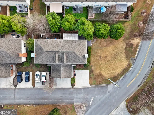 an aerial view of a house with swimming pool