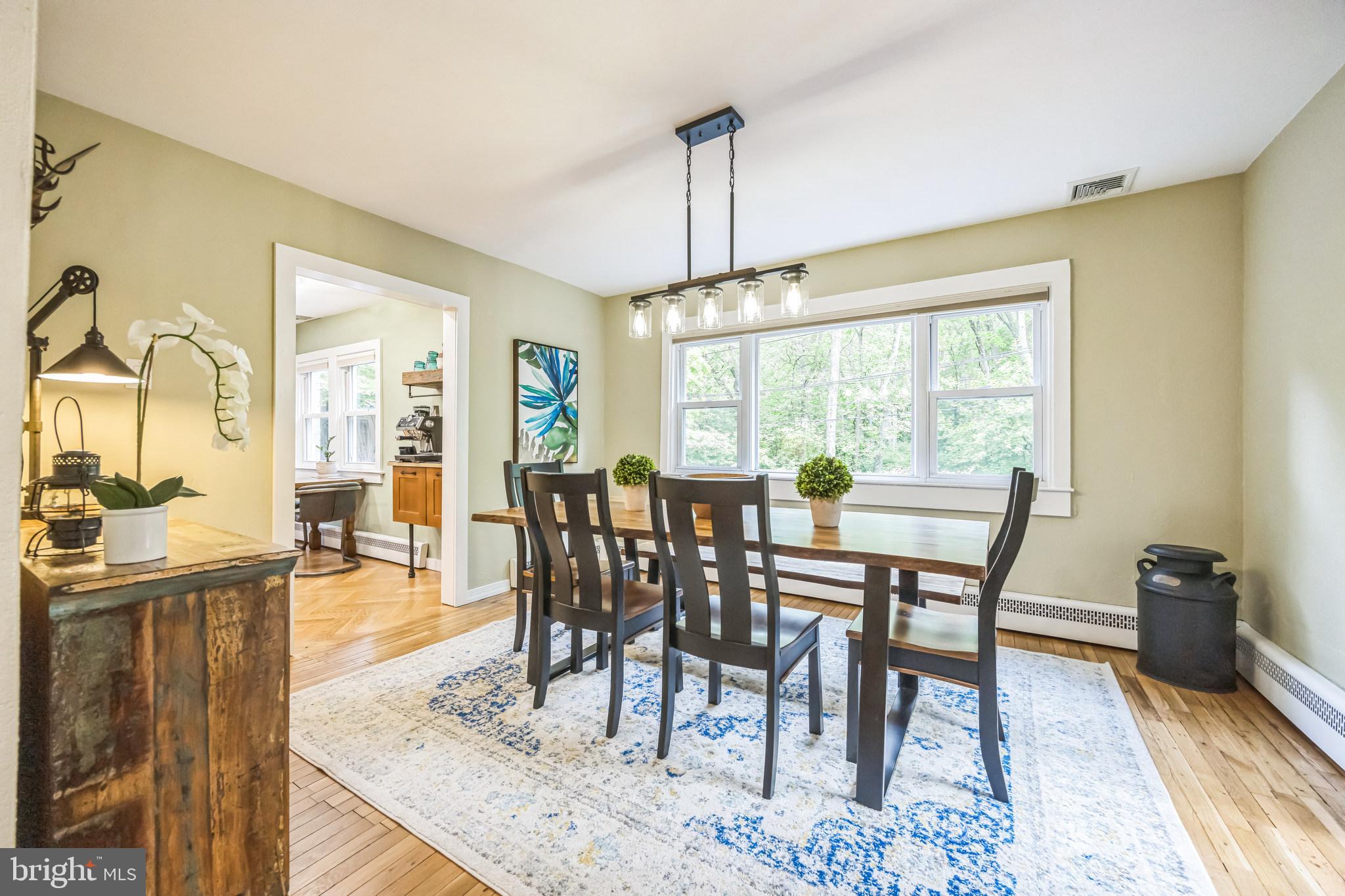 700 Pine Ridge Road Media, PA 19063 - Photo 12 of 50 a view of a dining room with furniture window and wooden floor