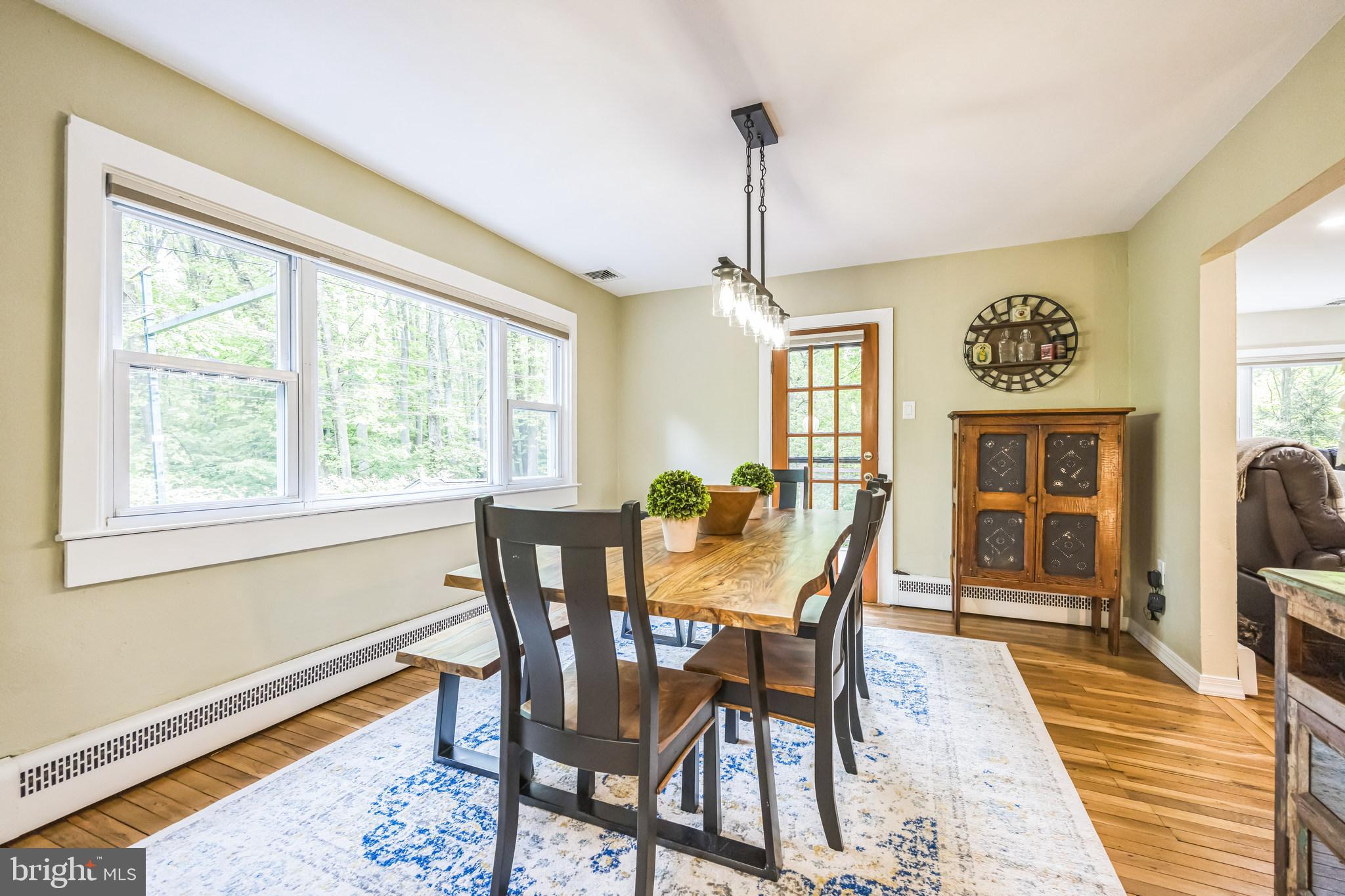 700 Pine Ridge Road Media, PA 19063 - Photo 14 of 50 a view of a dining room with furniture window and wooden floor