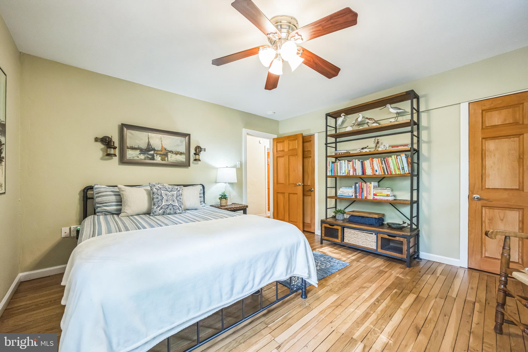 700 Pine Ridge Road Media, PA 19063 - Photo 19 of 50 a bedroom with a bed and a chandelier