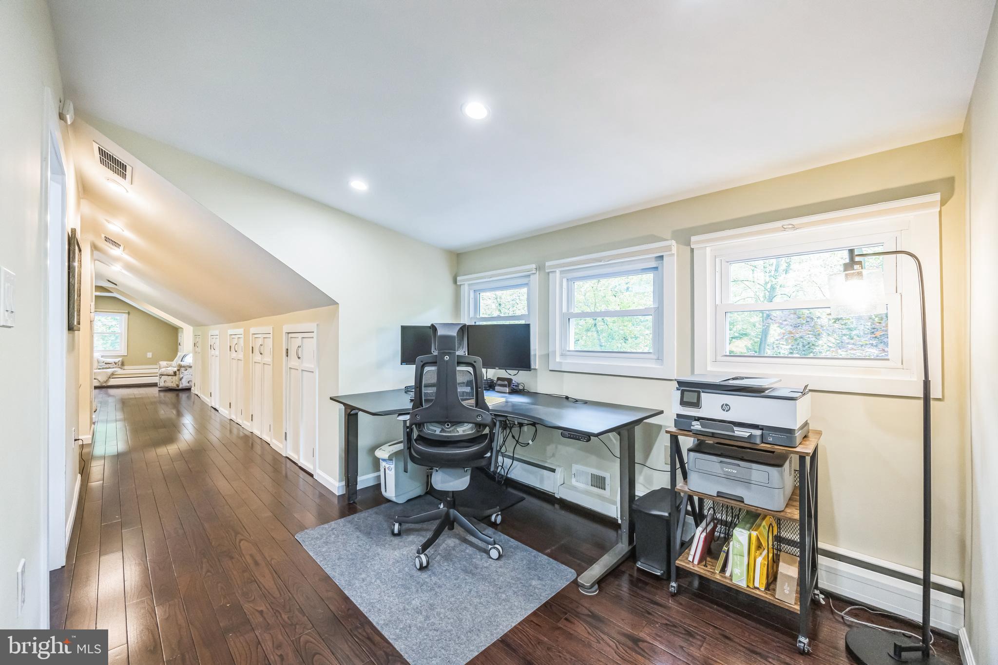 700 Pine Ridge Road Media, PA 19063 - Photo 30 of 50 a living room with wooden floor furniture and a window