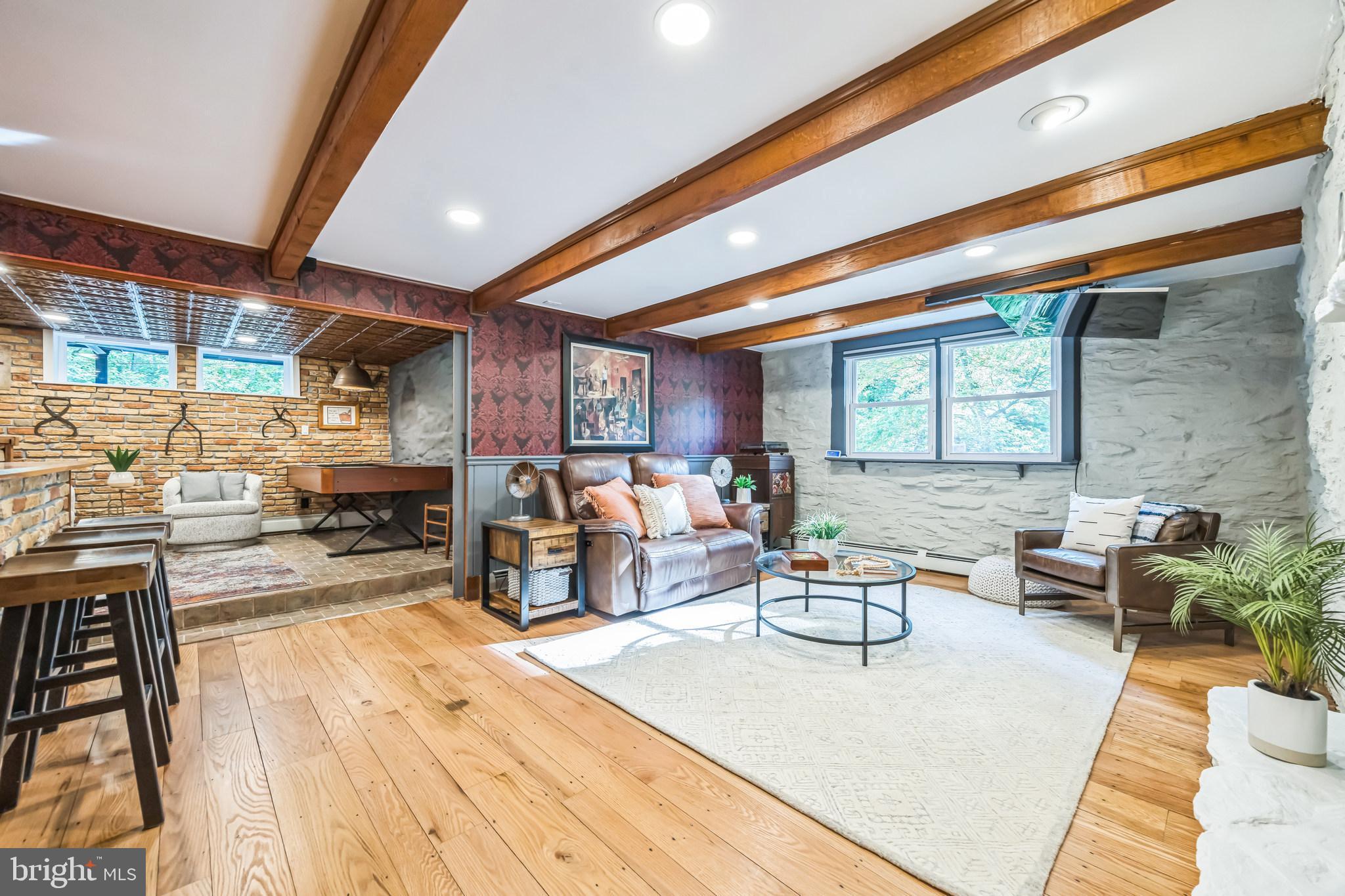 700 Pine Ridge Road Media, PA 19063 - Photo 36 of 50 a living room with furniture and a wooden floor