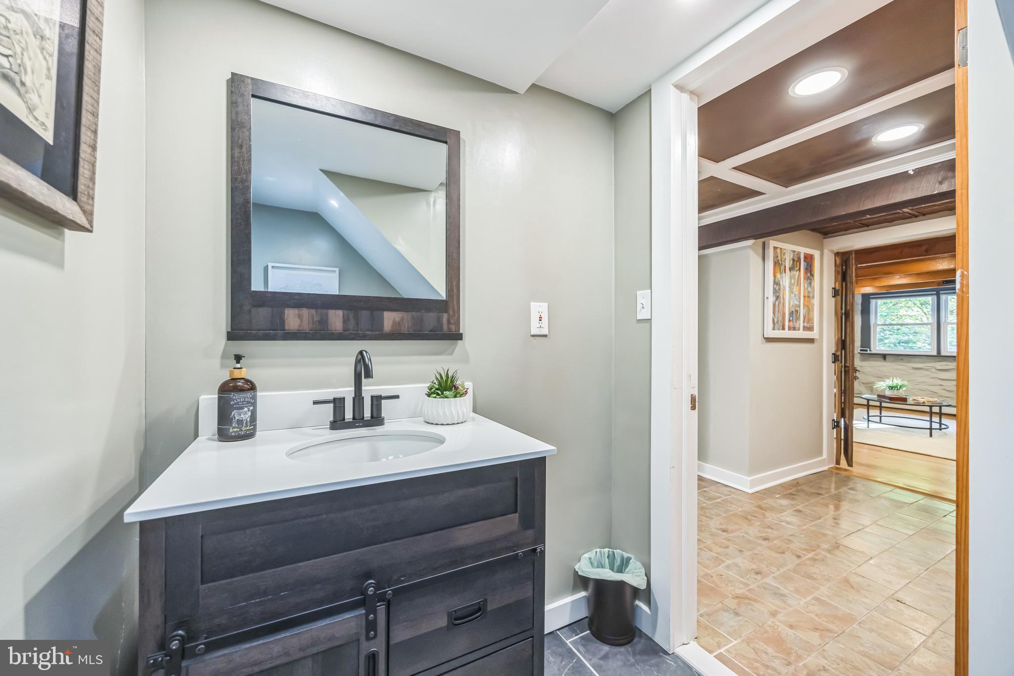 700 Pine Ridge Road Media, PA 19063 - Photo 41 of 50 a bathroom with a sink vanity and a mirror