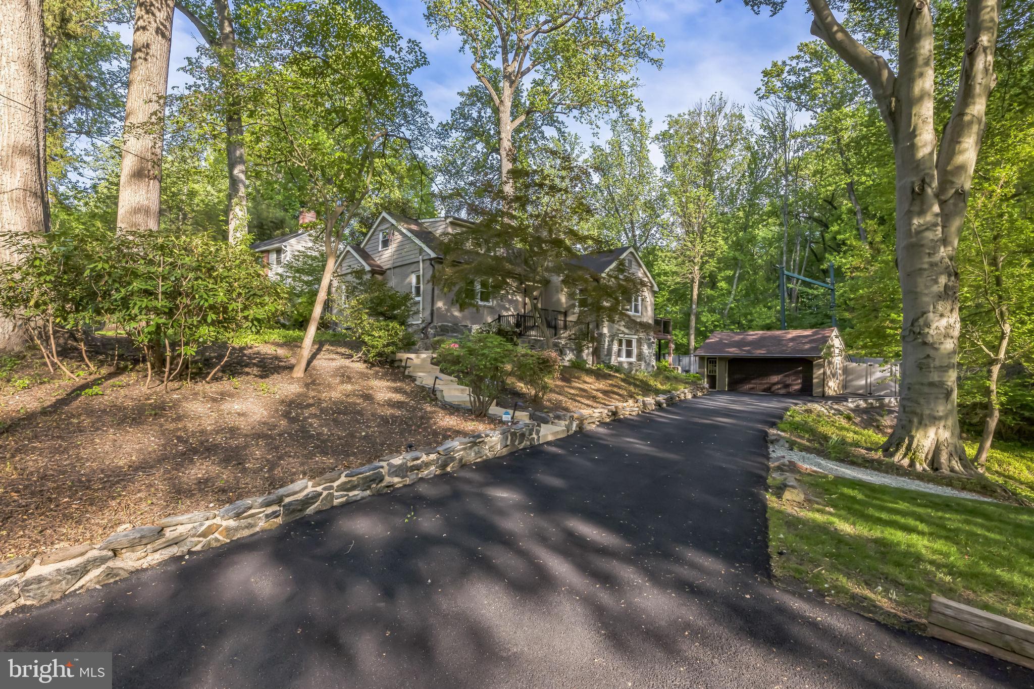 700 Pine Ridge Road Media, PA 19063 - Photo 48 of 50 a backyard of a house with lots of green space