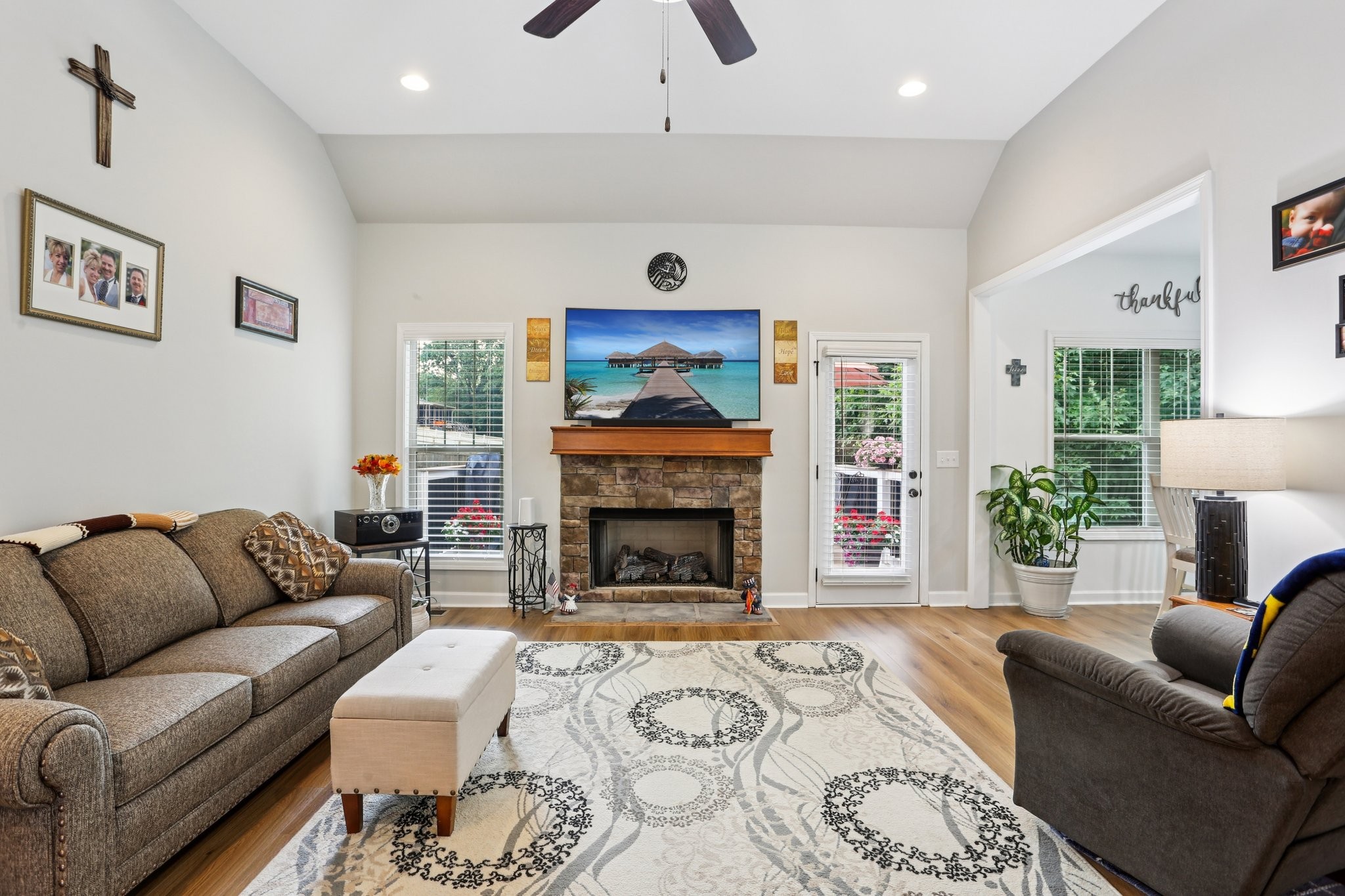 3045 Tacoma Lane Goodlettsville, TN 37072 - Photo 11 of 47 a living room with furniture a flat screen tv and a fireplace