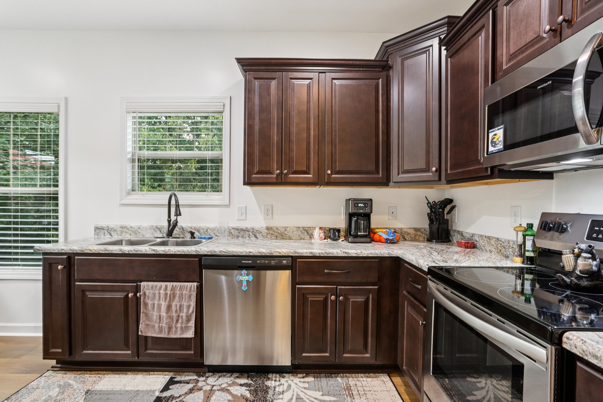 3045 Tacoma Lane Goodlettsville, TN 37072 - Photo 17 of 47 a kitchen with stainless steel appliances granite countertop a stove a sink and a microwave