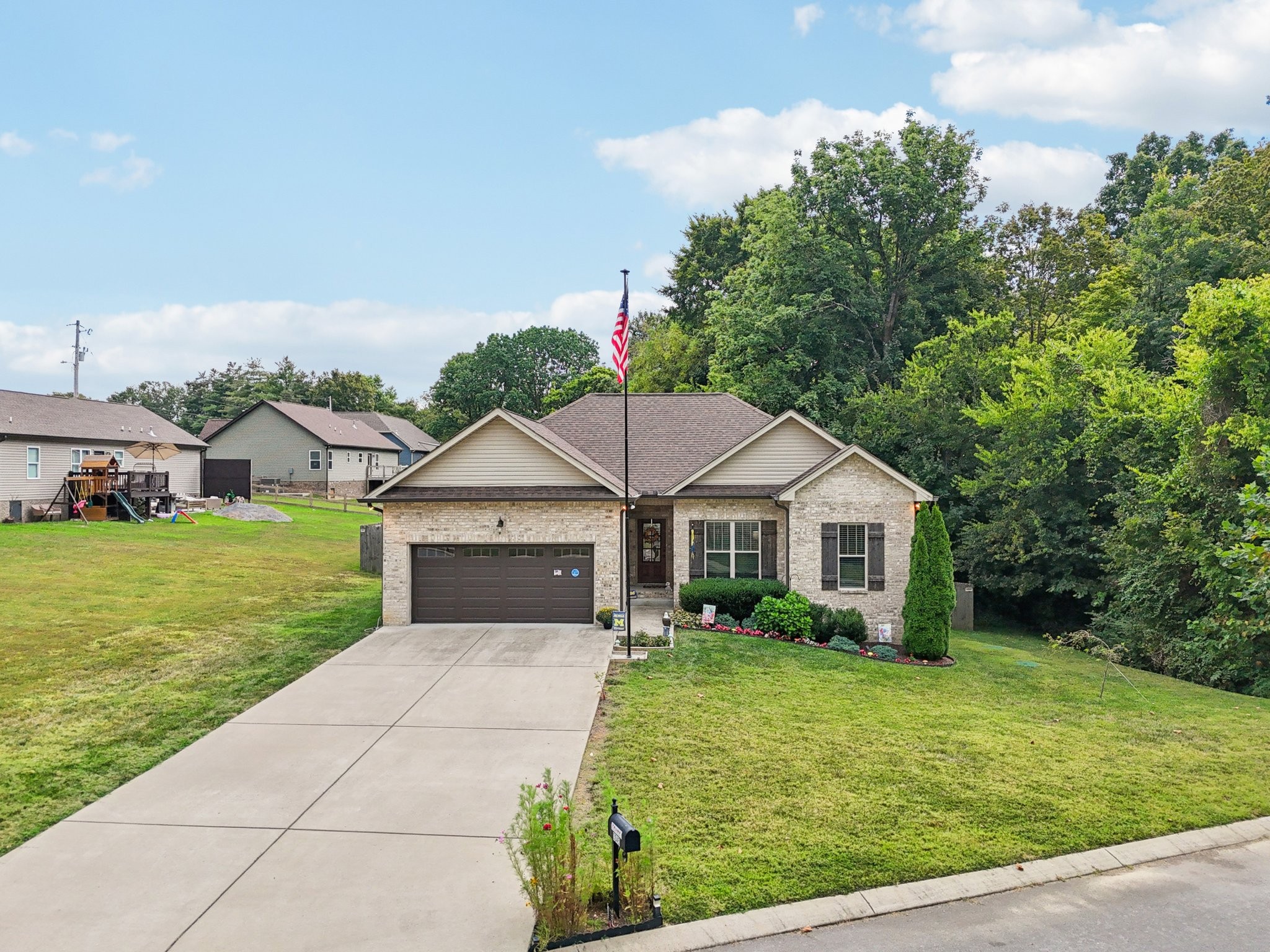 3045 Tacoma Lane Goodlettsville, TN 37072 - Photo 2 of 47 a front view of a house with garden
