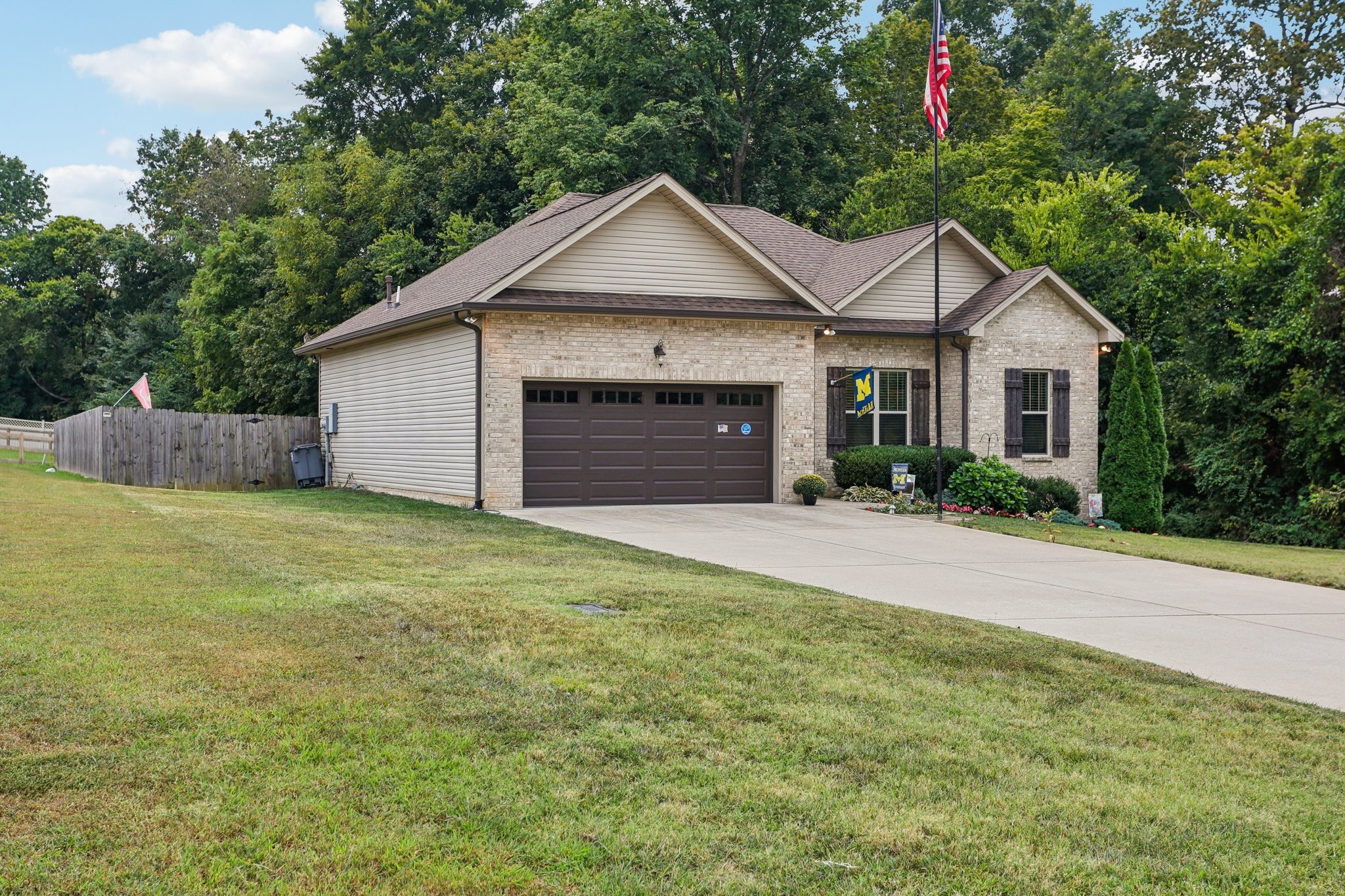 3045 Tacoma Lane Goodlettsville, TN 37072 - Photo 3 of 47 a view of a house with a yard and garage