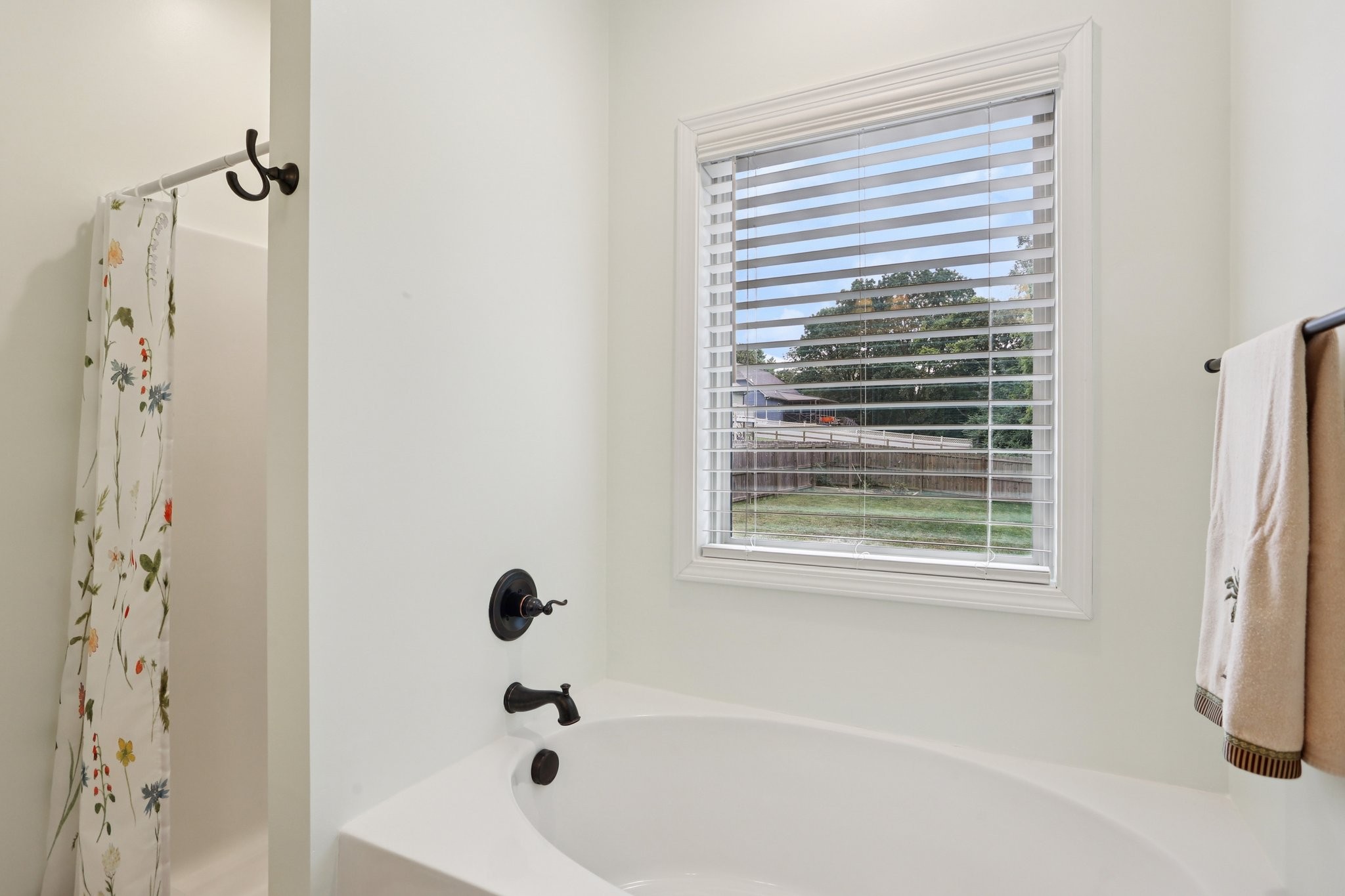 3045 Tacoma Lane Goodlettsville, TN 37072 - Photo 31 of 47 a bathroom with a tub a window and a shower
