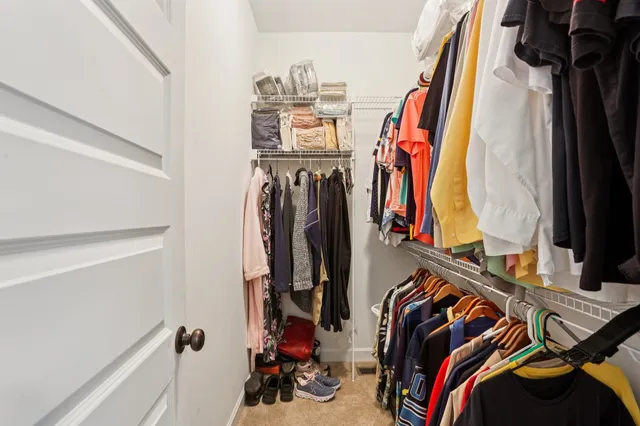 an outdoor space with furniture and umbrella