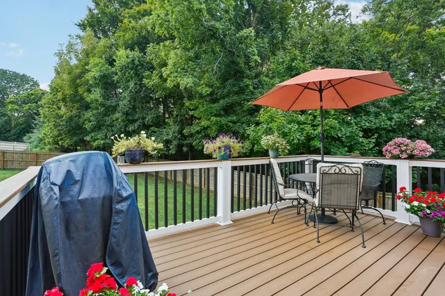 a view of a patio with furniture