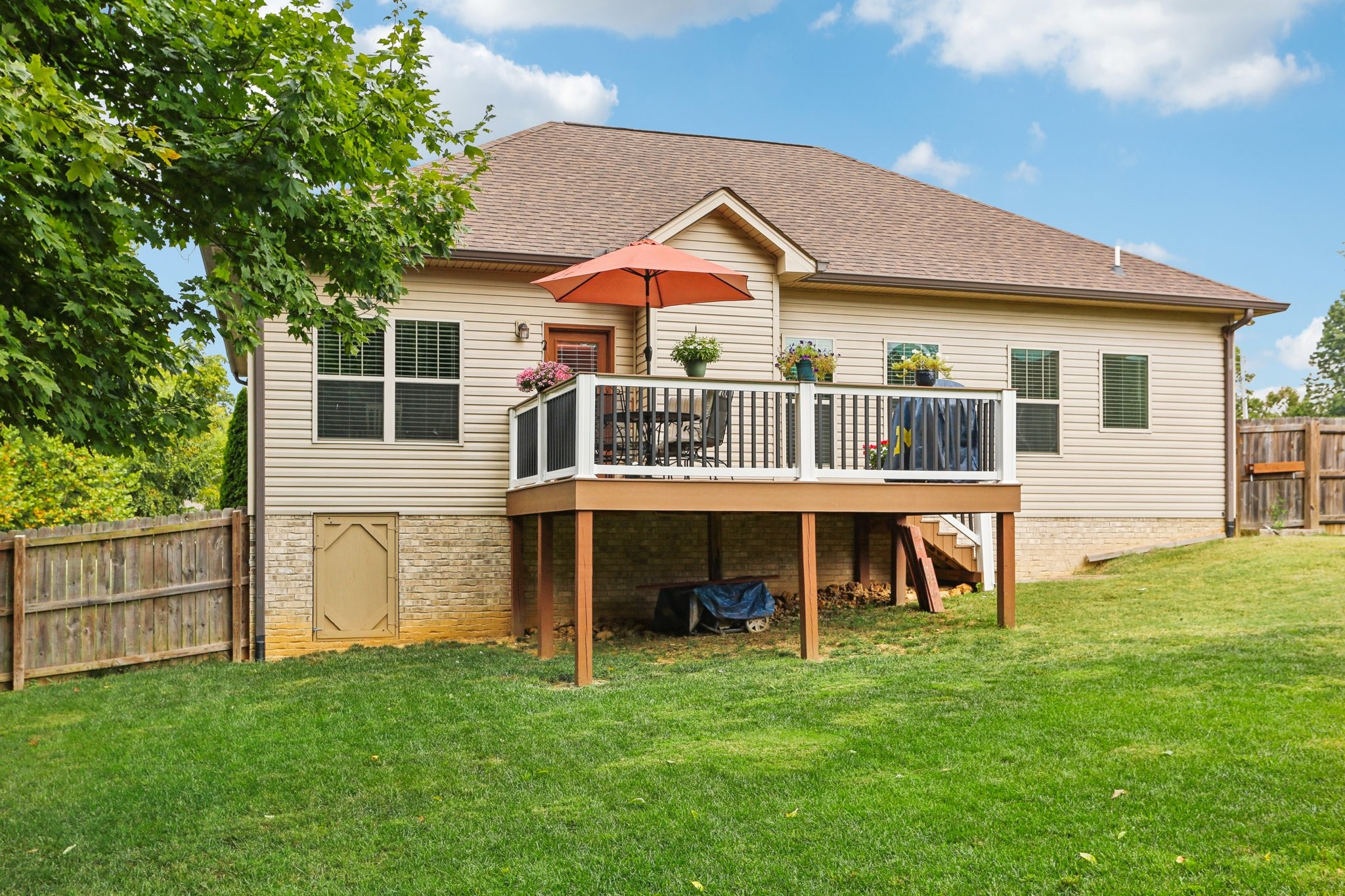 3045 Tacoma Lane Goodlettsville, TN 37072 - Photo 38 of 47 a view of a house with a yard and deck