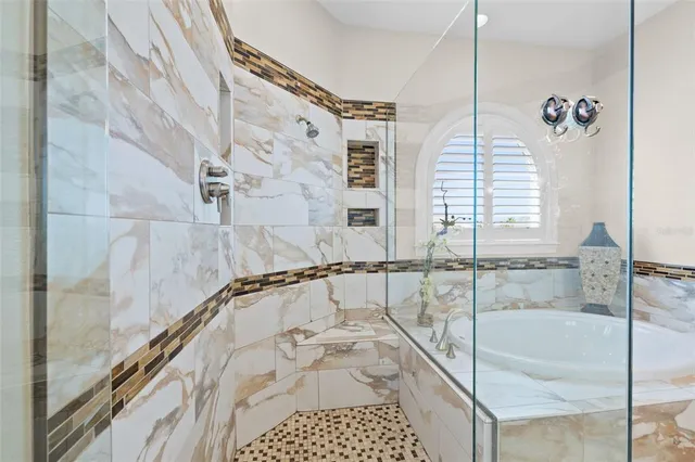 a view of swimming pool with a patio