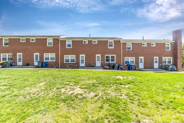 a view of a city street with cars