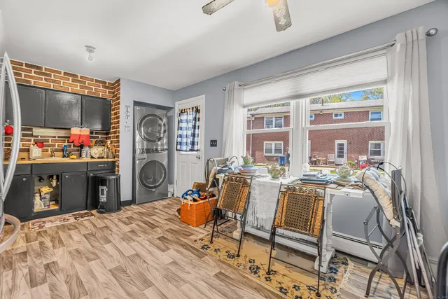 a view of storage and utility room with washer and dryer