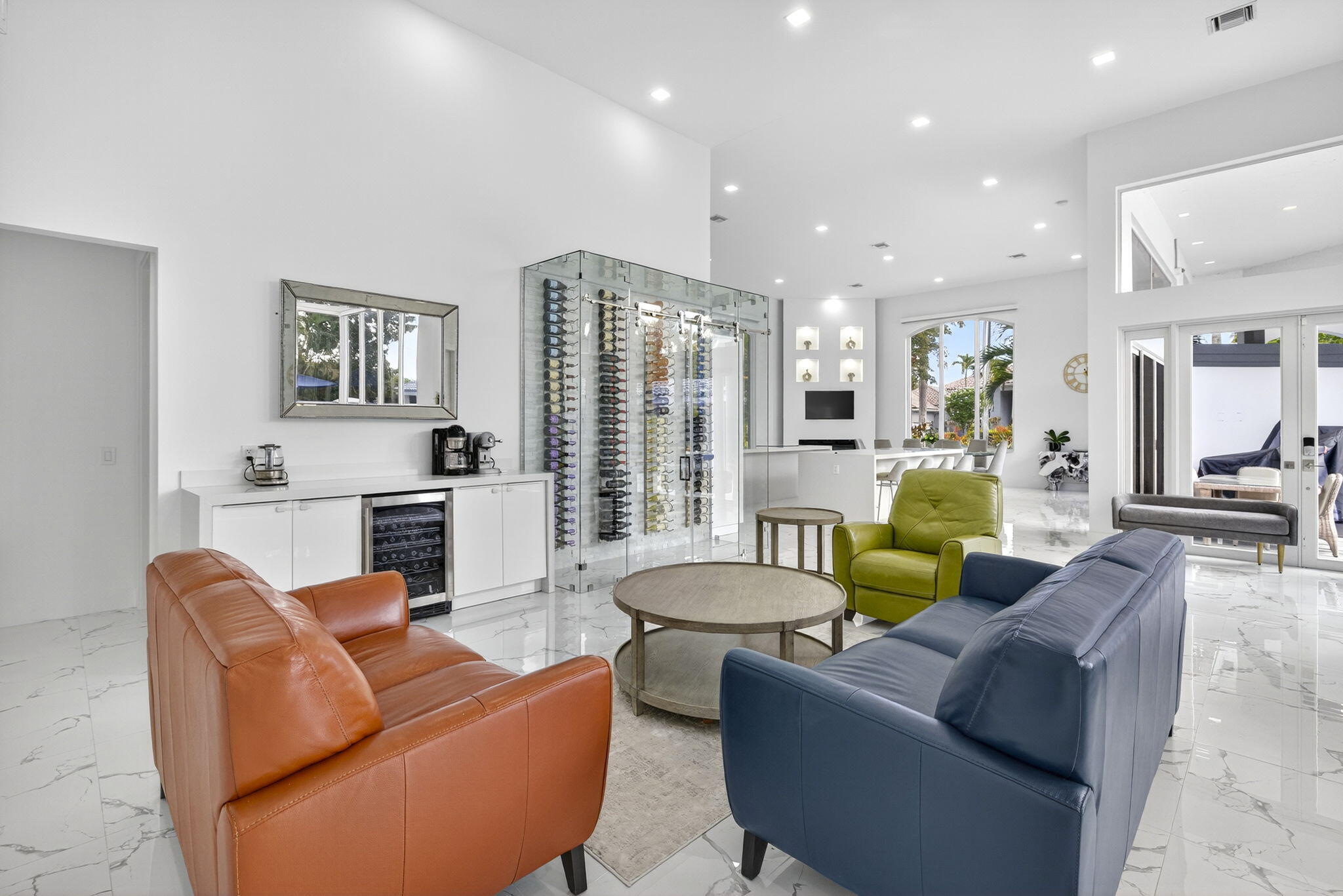 2673 Northwest 64th Boulevard Boca Raton, FL 33496 - Photo 11 of 64 a living room with furniture and a view of kitchen