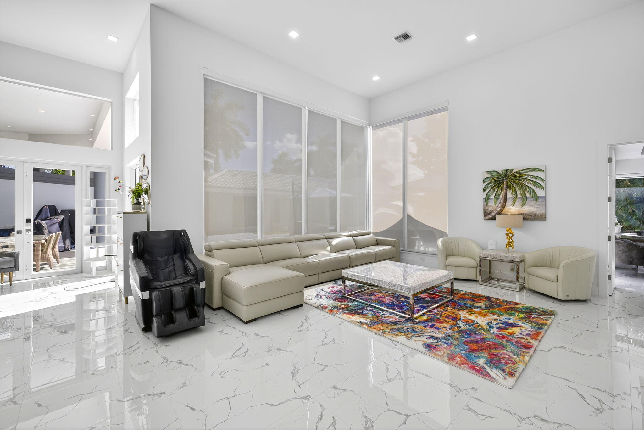 2673 Northwest 64th Boulevard Boca Raton, FL 33496 - Photo 14 of 64 a living room with furniture and large windows