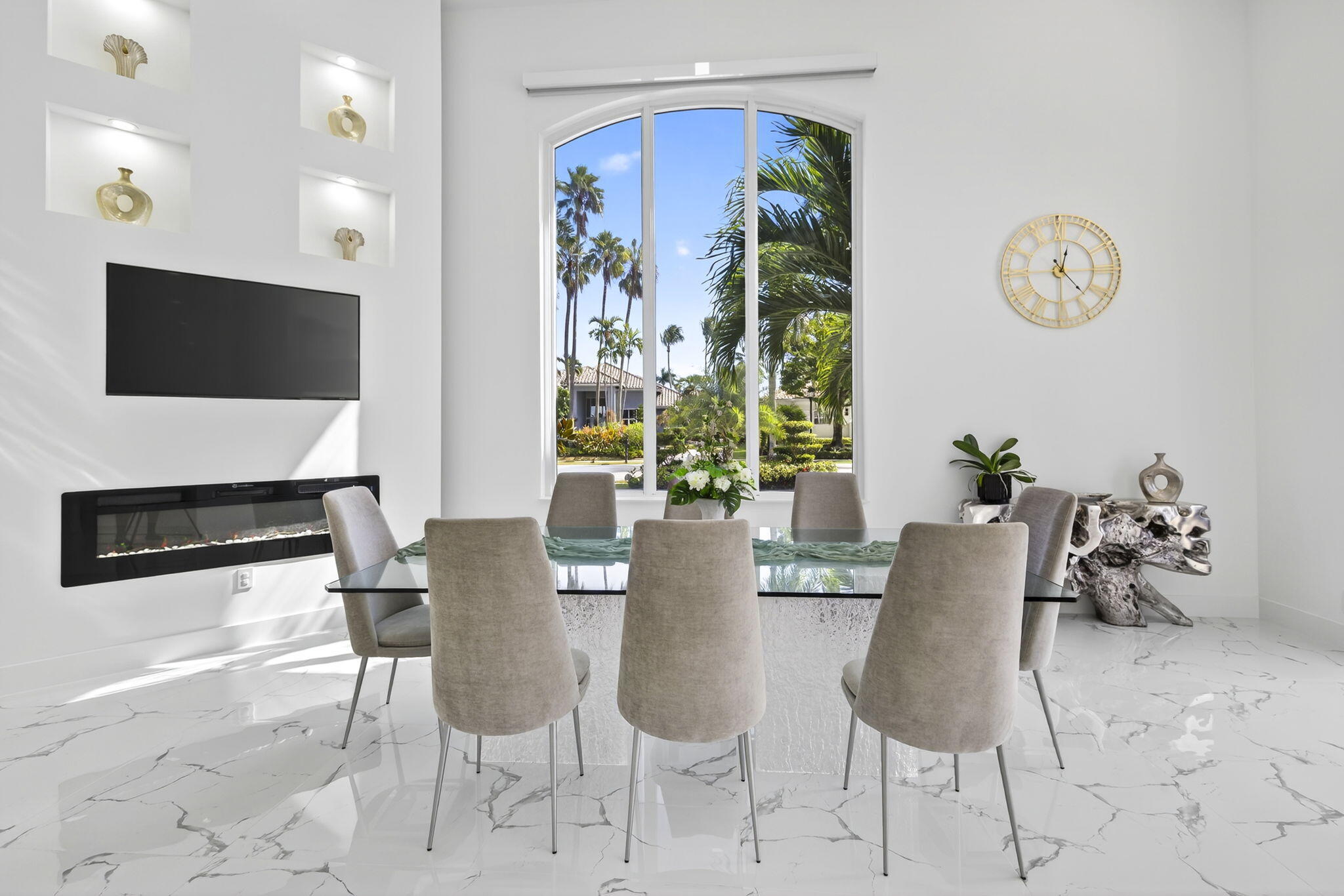 2673 Northwest 64th Boulevard Boca Raton, FL 33496 - Photo 26 of 64 a dining room with furniture and a flat screen tv