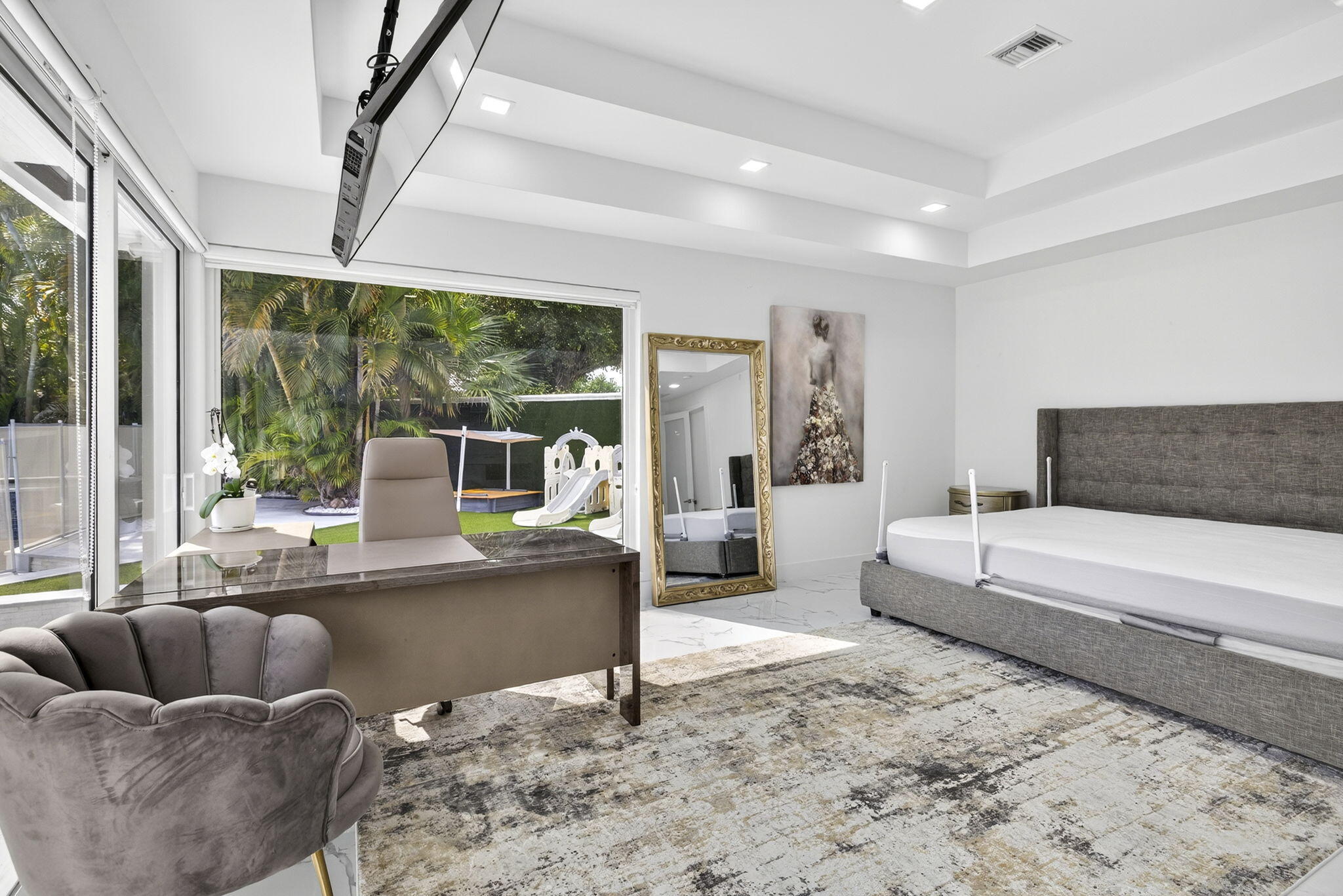 2673 Northwest 64th Boulevard Boca Raton, FL 33496 - Photo 27 of 64 a living room with furniture and a large window