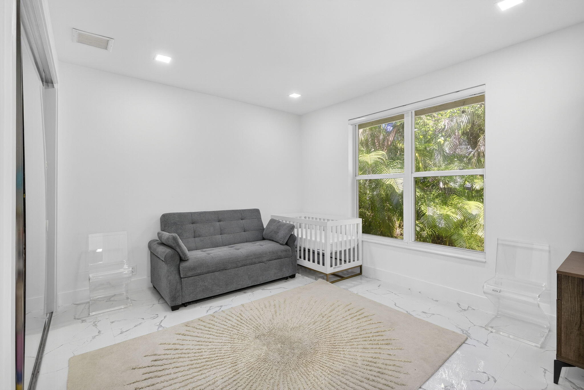2673 Northwest 64th Boulevard Boca Raton, FL 33496 - Photo 31 of 64 a living room with furniture and a window